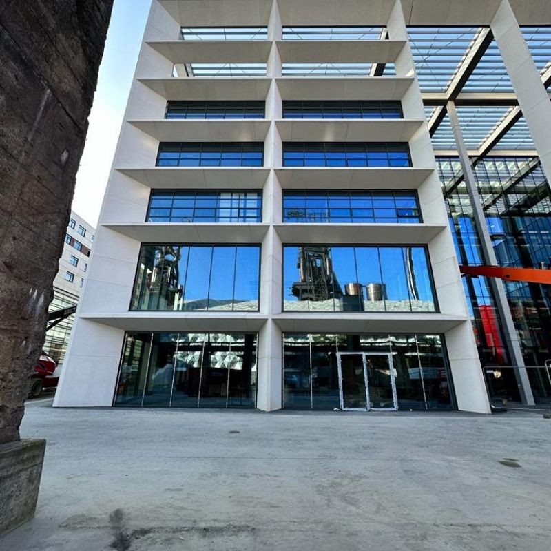 Front view of the ICONE building in Luxembourg with integrated glazing and modular structure